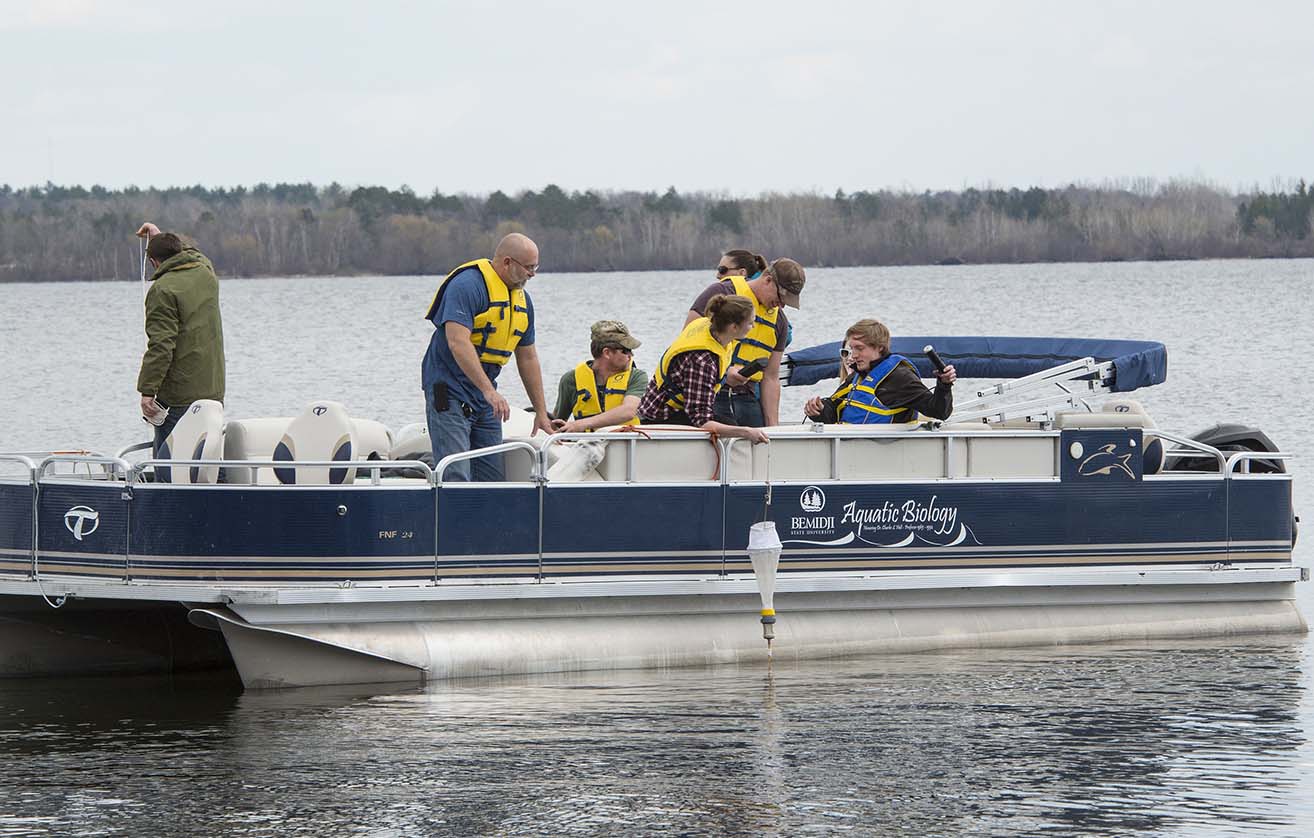 Students and faculty on the H.T. Peters Aquatics Lab pontoon