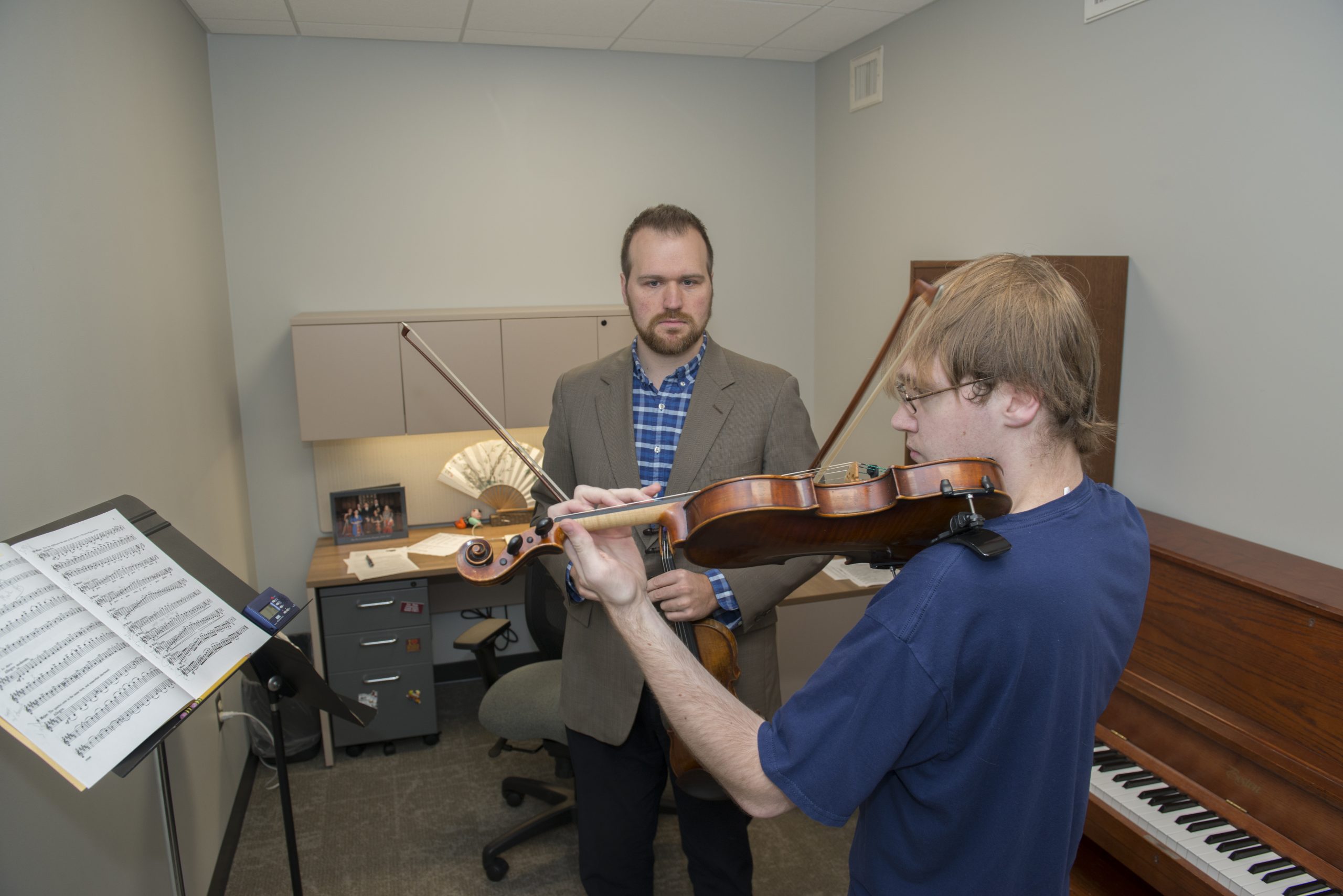Dr. Eric Olson Instructing Violin Student