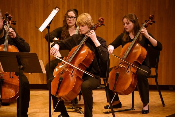 Bemidji State Chamber Orchestra cello players performing in 2022