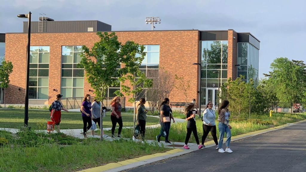 Bemidji State students walking in front of Hagg Sauer