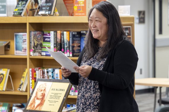 Tammy Bobrowsky reading at the Mike Herbert library event