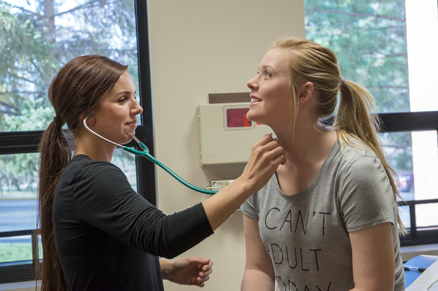 Nursing lab at Bemidji State with one student examining another