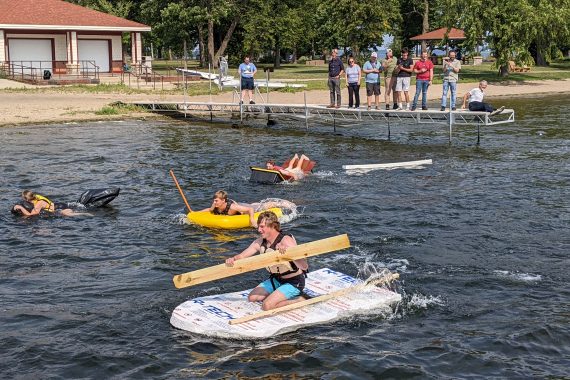 Design strengths and weaknesses become apparent at the very start of the race! Foam paddleboard takes an early lead in boat race