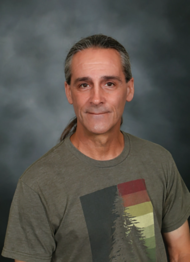 Headshot of Tom Daly