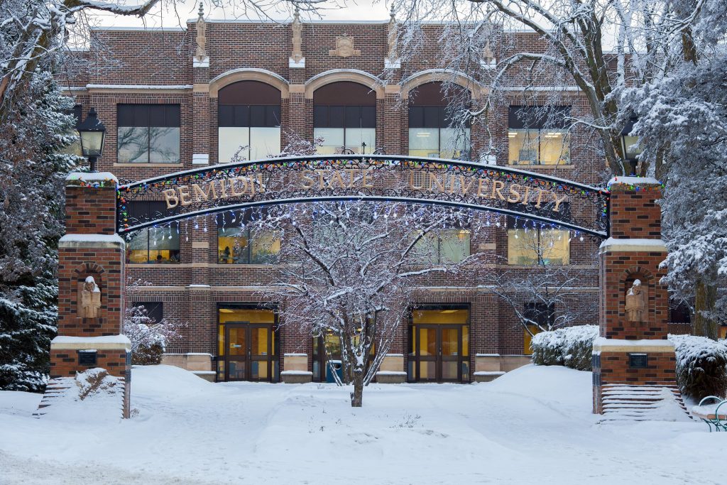 BSU Archway decorated with lights and covered in snow