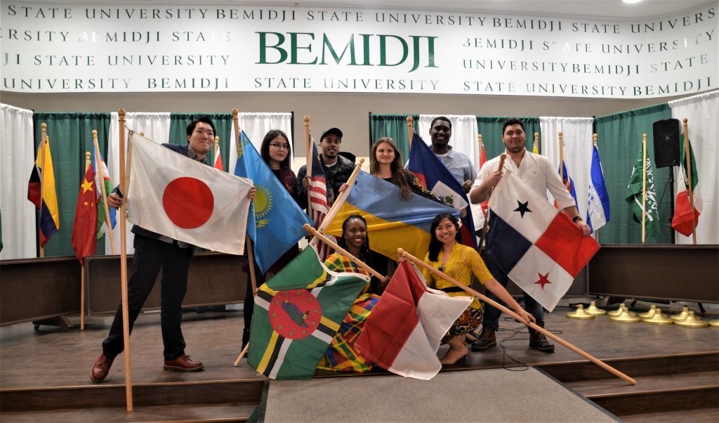 International Students holding their countries flag