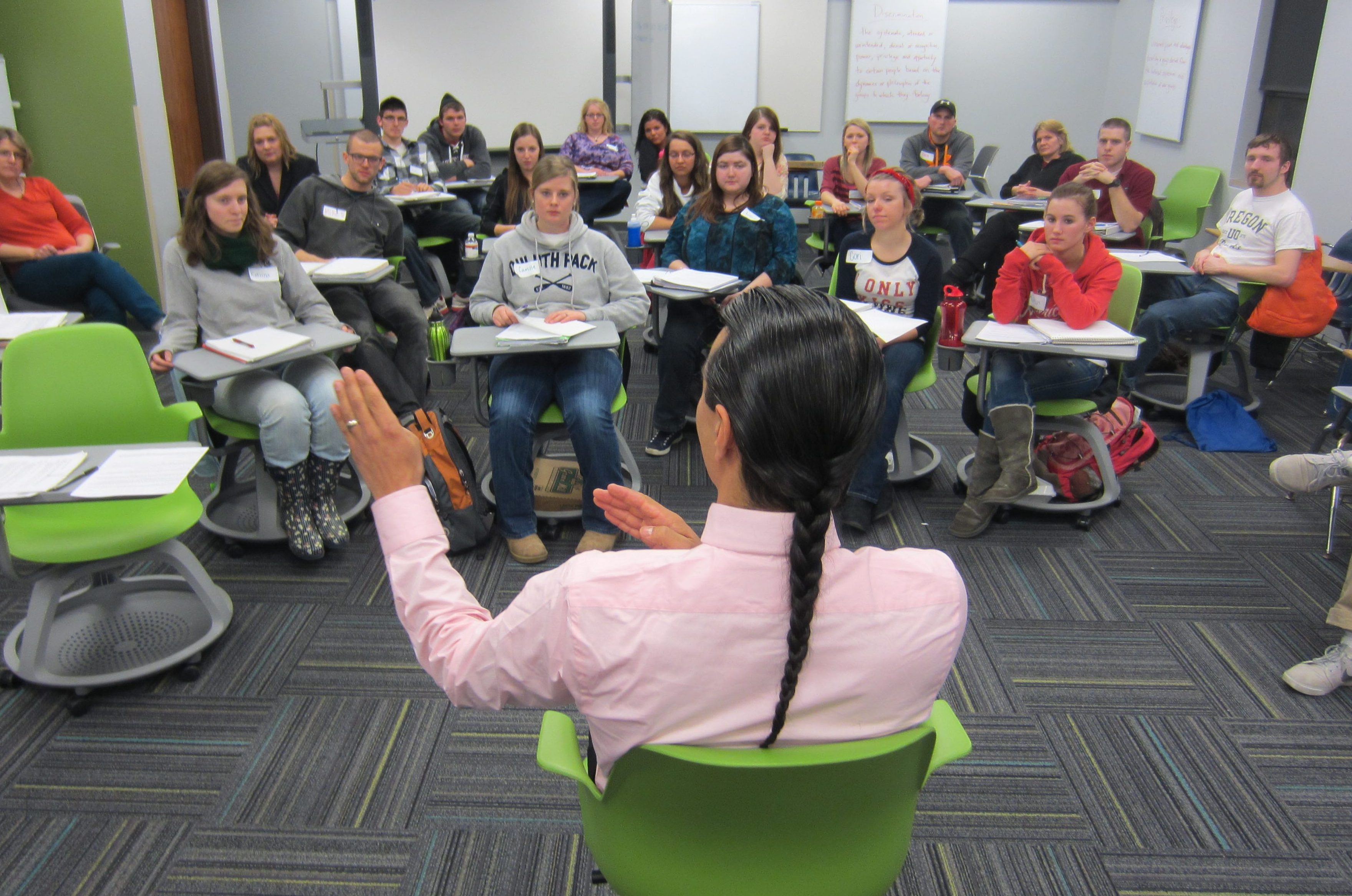 Small group of students learning from a teacher