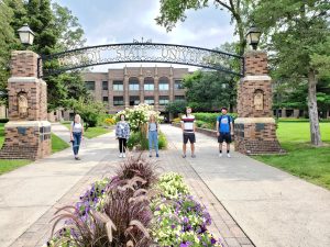 Students Underneath the BSU Arch