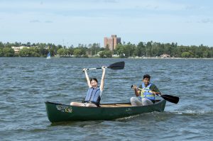Two students canoeing on Lake Bemidji