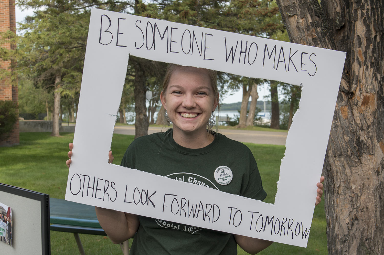 Student with banner