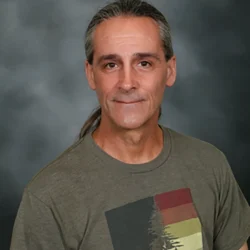 Headshot of Tom Daly