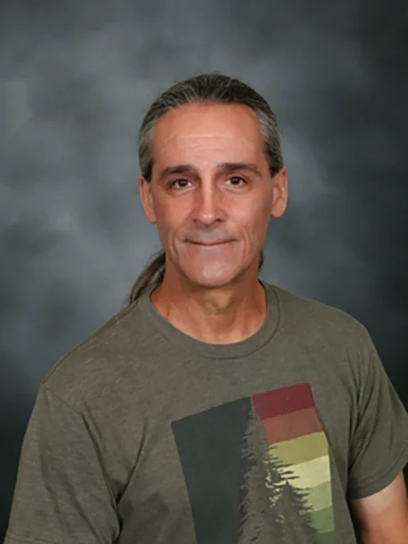 Headshot of Tom Daly