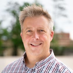 Headshot of Brad on campus.