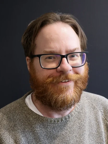 Headshot of Justin.