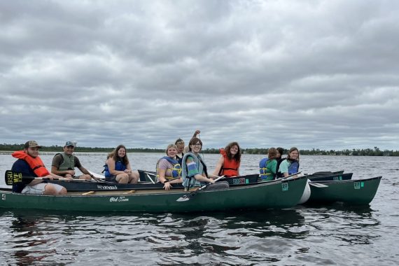 Students in canoes.