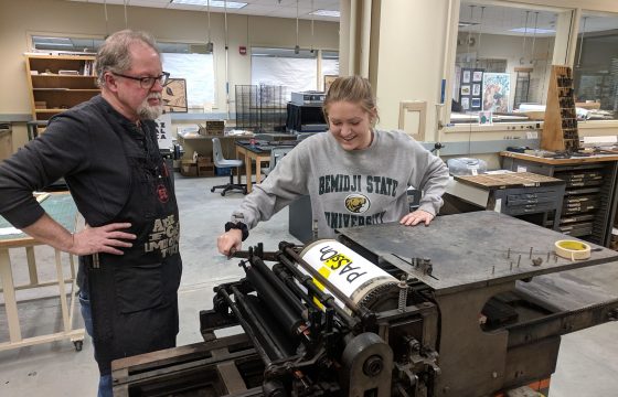 BSU Students participating in a TAD school woodpress workshop