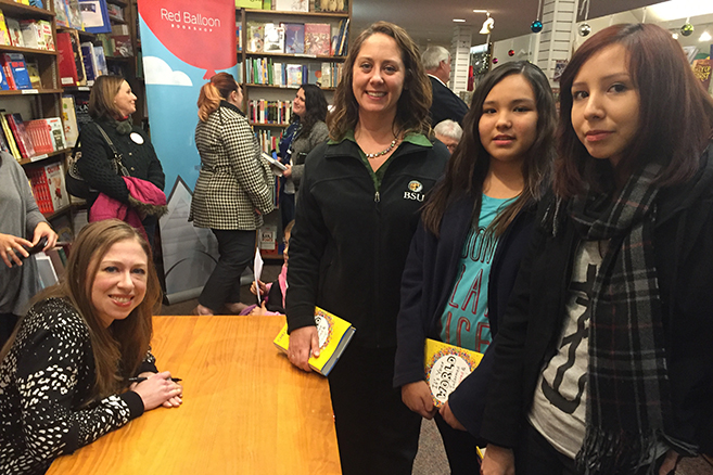 Chelsea Clinton meets with BSU staff member Jennifer Theisen and Red Lake High School students Diamond Cloud-Sayers and Alise May (right) in a St. Paul bookstore. The girls, who belong to a Bemidji State chapter of Girls Who Code, are mentioned in Clinton’s book, “It’s Your World.”