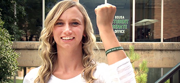 Student Senate President Brittany Hull shows off her Save Our Students bracelet in a student-produced video titled “Who’s Got Your Back?: No Buddy Left Behind.”