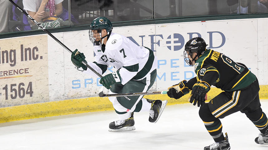 Bemidji State sophomore T.J. Roo (7) and Alaska Anchorage's Mason Mitchell (8) chase after a loose puck during a game held Oct. 29 at the Sanford Center in Bemidji.