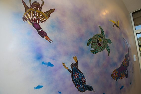 Gallery: Leah Yellowbird Paints Entryway Mural at AIRC