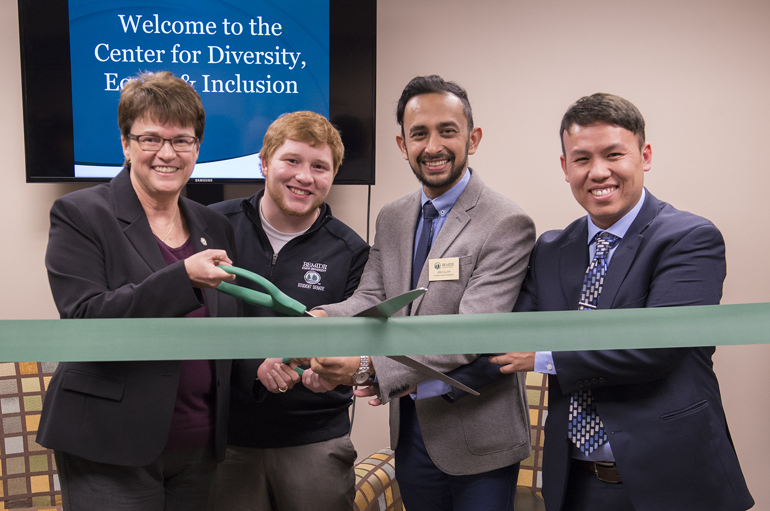 L to R: BSU President Faith C. Hensrud; Kale Hennek and Ash Ullah, BSU Student Senate; Dr. Brian Xiong, center coordinator.