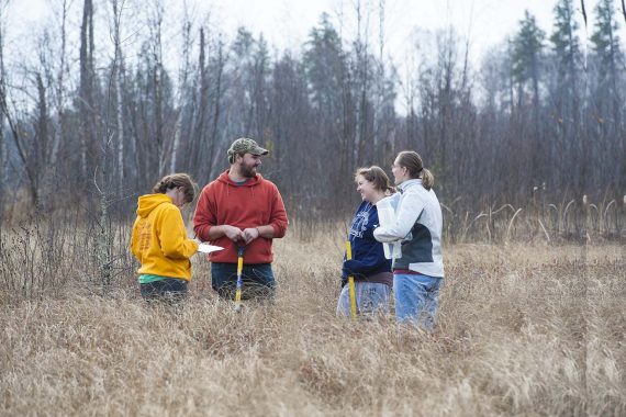 Students in a 2014 Wetlands Ecology course log their research at BSU&rsquo;s Hobson Memorial Forest.