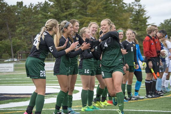 The Beavers get fired up during team introductions before their Oct. 22 home game against Winona State University.