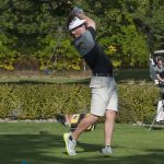 Freshman golfer Ian MacKenzie-Olson takes a fairway shot Sept. 14 at the BSU Invitational at Bemidji Town and Country Club.