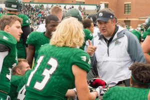 Head Coach Brent Bolte directs the team in Chet Anderson Stadium.