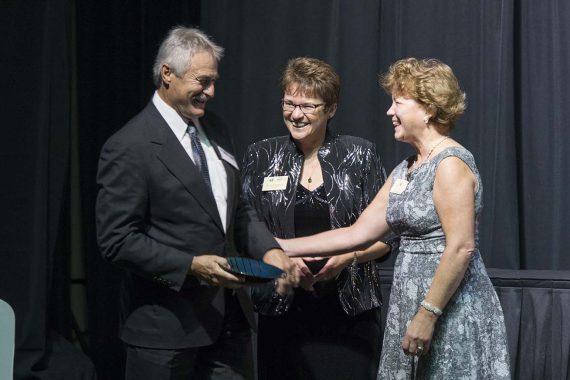 Ed and Marla Patrias, executive director of the Alumni & Foundation, are recognized by President Faith Hensrud for $50,000 of lifetime giving to BSU.