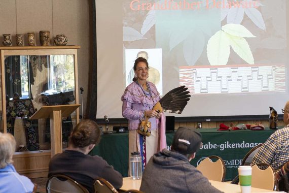 Assistant Professor Dr. Nicky Michael presents during Indigenous Peoples & Treaty Day events Aug. 9 in the American Indian Resource Center.