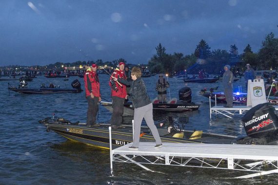 President Faith Hensrud opened the tournament Aug. 10 with a ceremonial first cast.