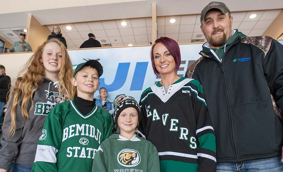 Norbord employee Nick Brown and family members enjoy the Beavers’ Oct. 15 win over Alaska Anchorage.