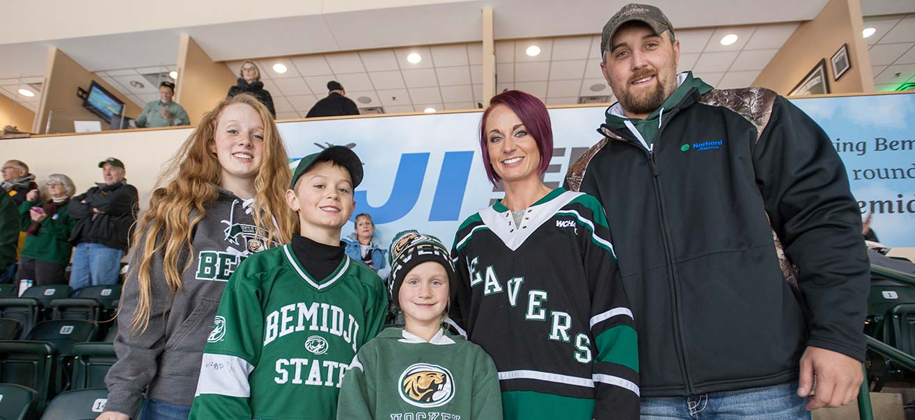 Norbord employee Nick Brown and family members enjoy the Beavers’ Oct. 15 win over Alaska Anchorage.