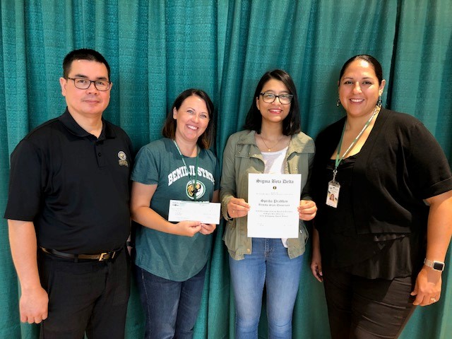 Spriha Pradhan, receiving the Association of College Honors Societies Accreditation Council for Business Schools and Programs (ACBSP) Region 4 2018 Sigma Beta Delta Fellowship Scholarship.