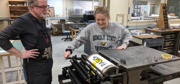 BSU Students participating in a TAD school woodpress workshop