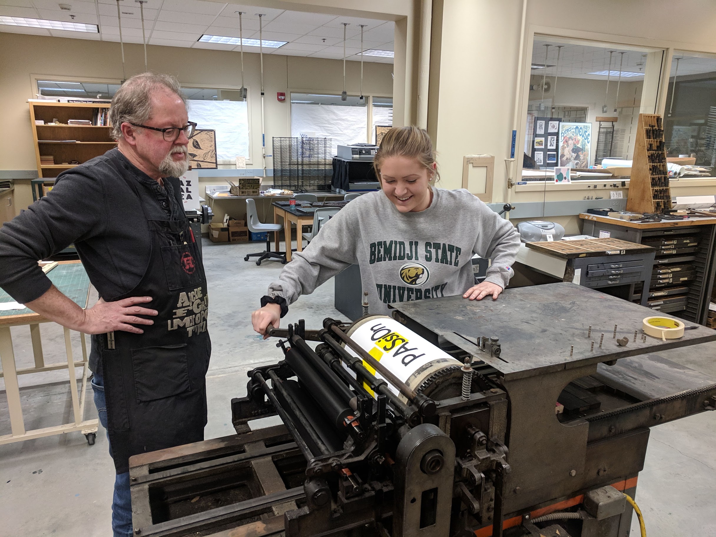 BSU Students participating in a TAD school woodpress workshop