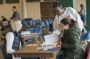 Assistance services and shelters were set up throughout the poverty simulation room.