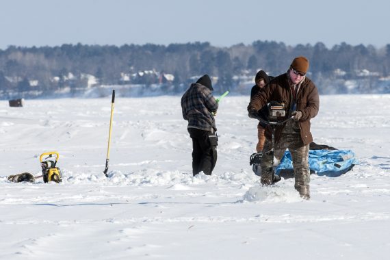 Participants enjoy ice fishing on Lake Bemidji.