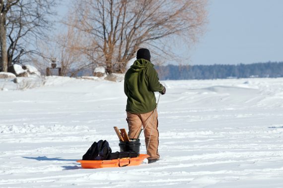 Participants enjoy ice fishing on Lake Bemidji.