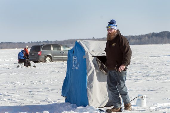 Participants enjoy ice fishing on Lake Bemidji.