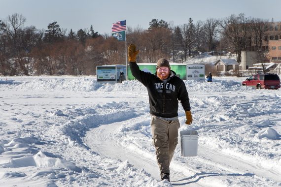 Participants enjoy ice fishing on Lake Bemidji.