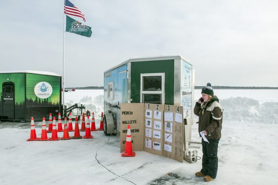 Participants enjoy ice fishing on Lake Bemidji.