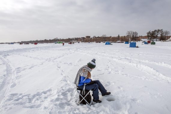 Participants enjoy ice fishing on Lake Bemidji.