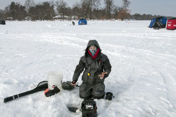 Participants enjoy ice fishing on Lake Bemidji.