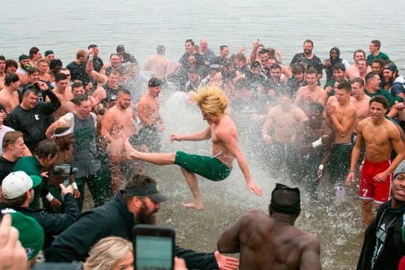 Homecoming victory lake jump