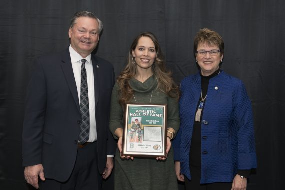 Tracy Dill, director of athletics, and President Faith Hensrud pictured with Andrea Zenner.