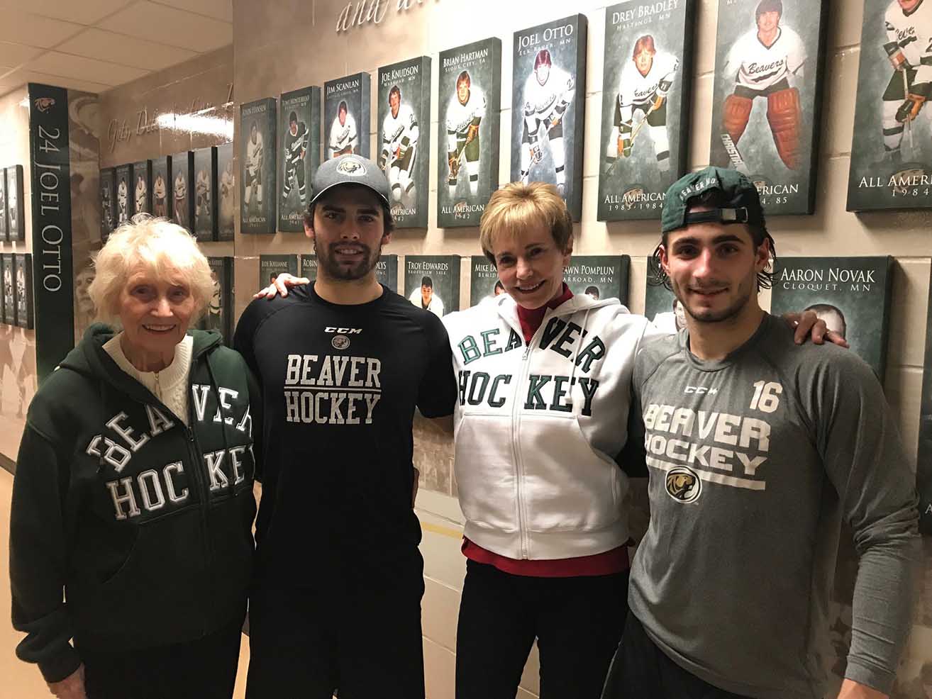 L to R: Cay Emkovik, sophomore men’s hockey forward Ethan Somoza, Cait Griffen, sophomore men’s hockey forward Aaron Miller