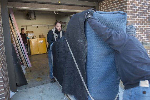 Schmitt's Music crew unloading BSU's Model B.