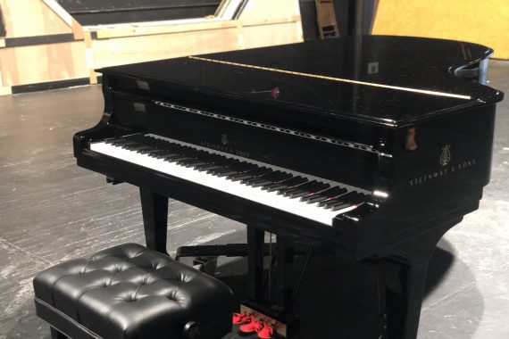 The Steinway is here.